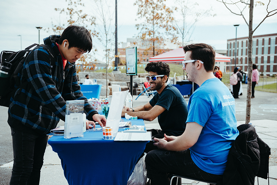 Student at table at Beacon Wellness Walk Resource Fair