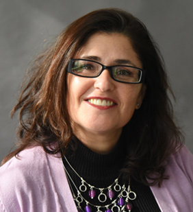 Natalia Scarpetti,  Senior Lecturer II, English