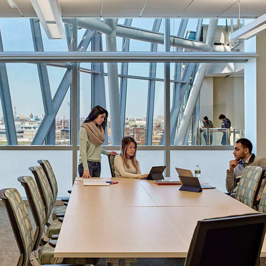 Students work in conference room in the Integrated  Sciences Complex.