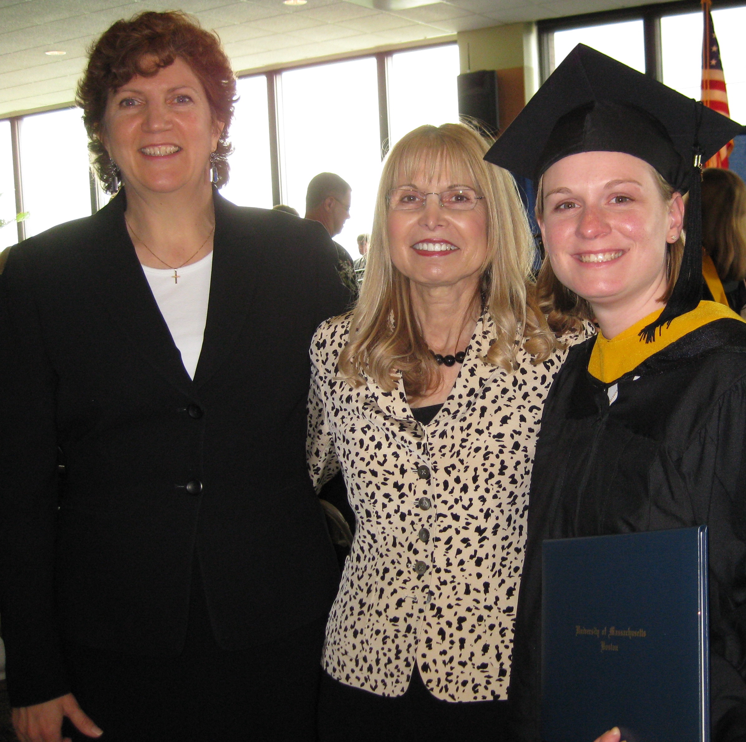 three women at graduation celebration