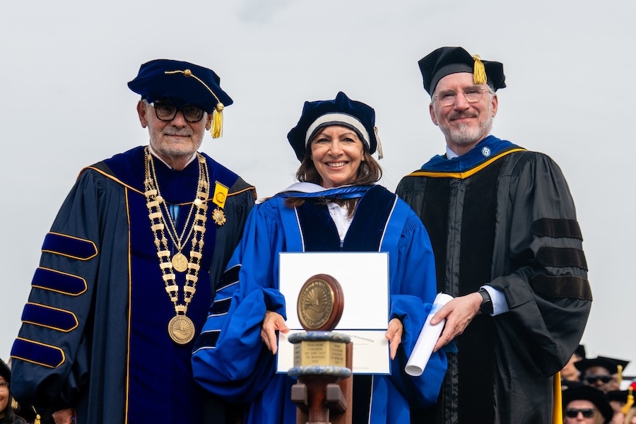 Chancellor, Hidalgo, and Provost standing holding honorary doctoral degree