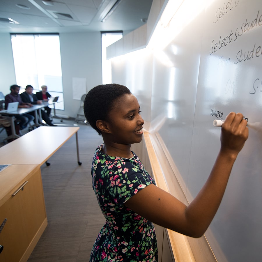 Graduate Student at Whiteboard