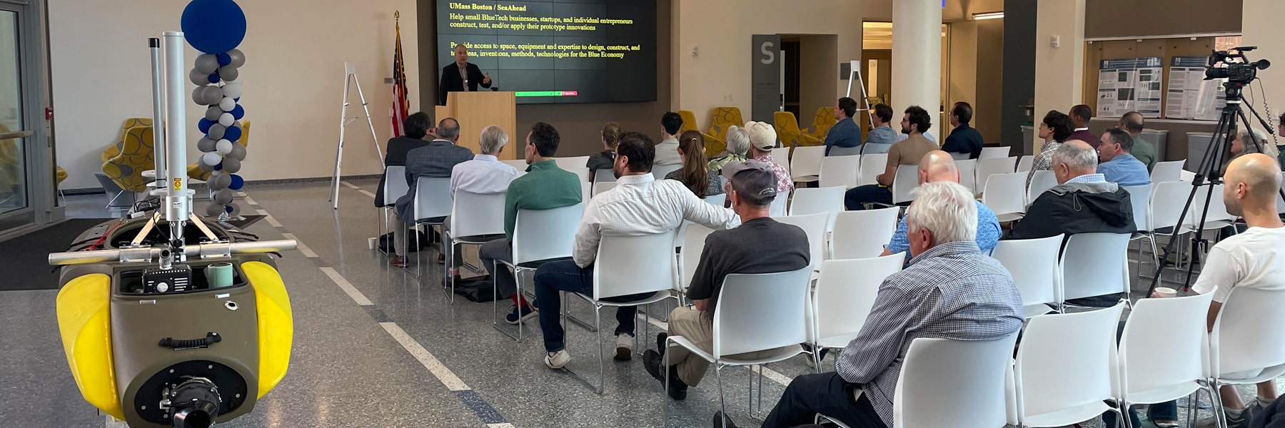 Beacon Lab Director Mark Borrelli addressing attendees of a Beacon Lab open house